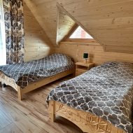 Dom z bali nad morzem, 3 apartamenty dwupoziomowe 